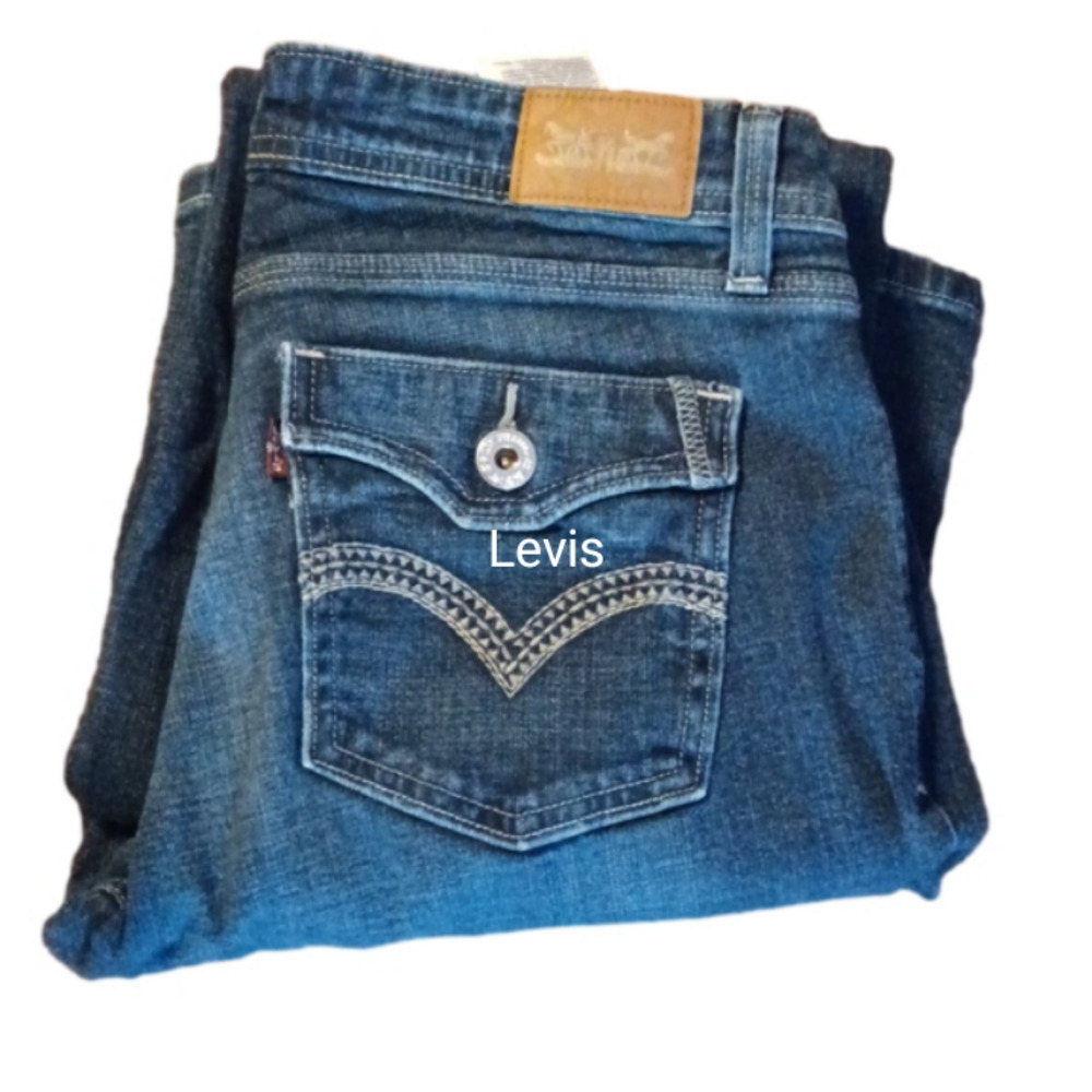 LEVIS 529, CURVY, BOOTCUT, WOEMS SIZE 7L. 5 POCKET, ZIP UP, BUTTON.